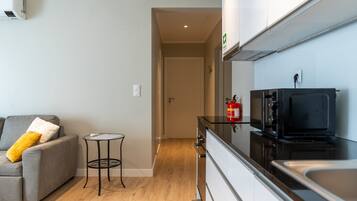 Coffee/tea maker, fridge, microwave, oven