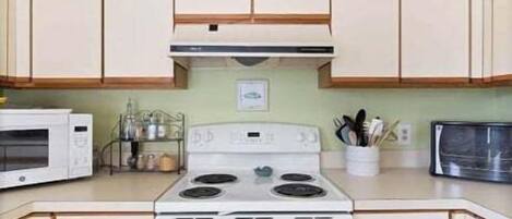 Coffee/tea maker, fridge, microwave, oven