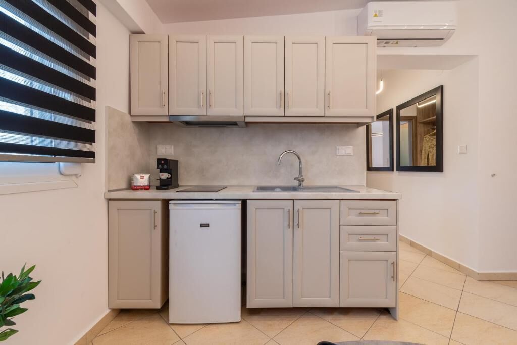 Family Suite, Balcony, Partial Sea View | Private kitchen