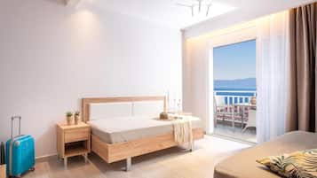 Luxury Suite, Balcony, Partial Sea View | Egyptian cotton sheets, premium bedding, Tempur-Pedic beds, in-room safe