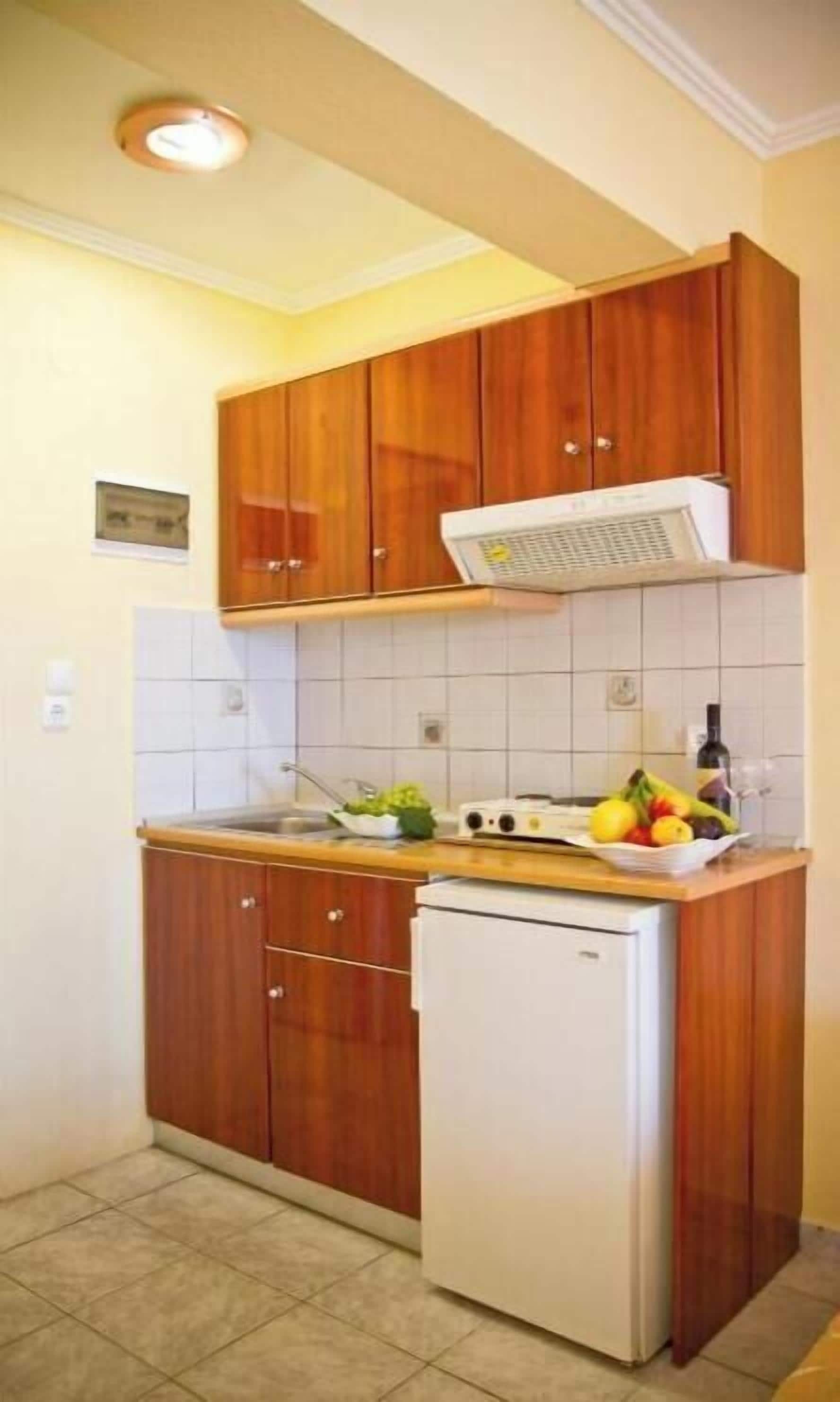 Microwave, high chair, cookware/dishes/utensils, freezer