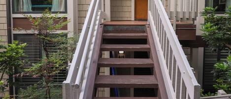 A staircase leading to a building entrance with a door labeled 'A6'.