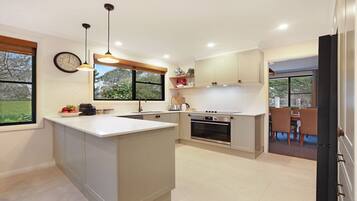 Coffee/tea maker, fridge, microwave, oven