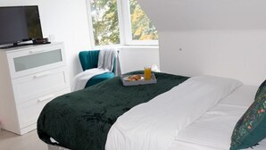 1 chambre, fer et planche à repasser, Wi-Fi, literie fournie
