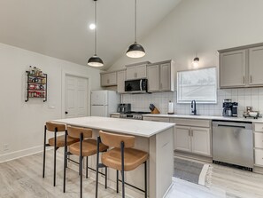 Coffee/tea maker, fridge, microwave, oven - Relax, reconnect, and enjoy the best of OKC! This family-friendly retreat features a hot tub, fire pit, large back patio, expansive backyard, and an open floor plan perfect for gathering. Conveniently located just 15–20 minutes from downtown. (Oklahoma City)