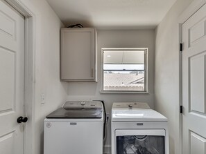 Interior - Relax, reconnect, and enjoy the best of OKC! This family-friendly retreat features a hot tub, fire pit, large back patio, expansive backyard, and an open floor plan perfect for gathering. Conveniently located just 15–20 minutes from downtown. (Oklahoma City)