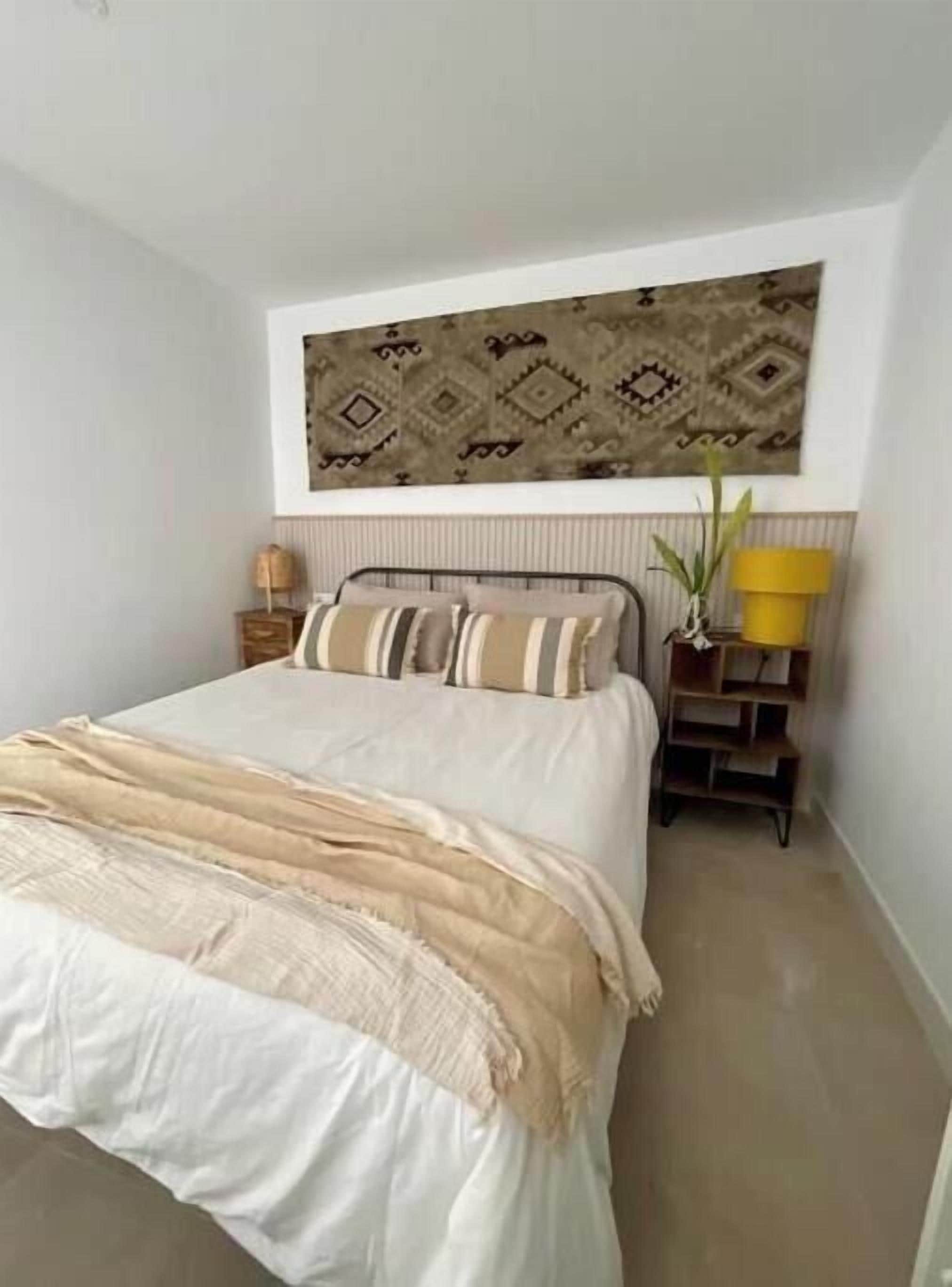 2 dormitorios, tabla de planchar con plancha, wifi y ropa de cama