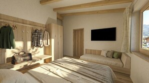 A room with a bed, a bench, a wardrobe, and a television.