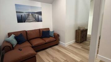 Smart TV, fireplace, table football, books