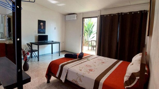 Chambre Triple Deluxe, vue jardin