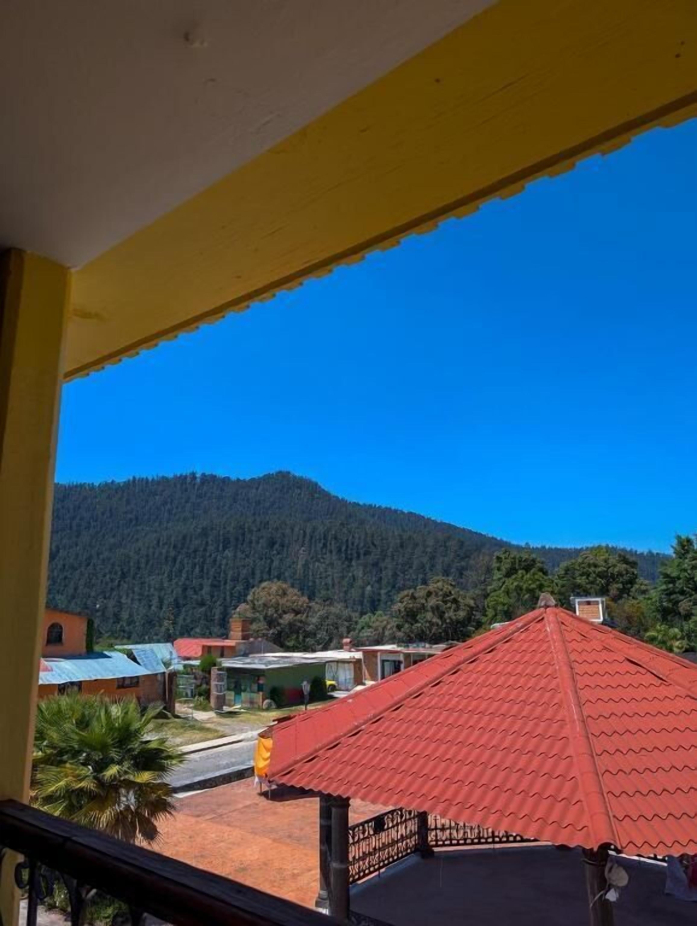 Quadruple Room, Balcony, City View | Property grounds