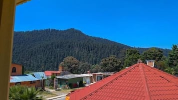 Quadruple Room, Balcony, City View | Property grounds
