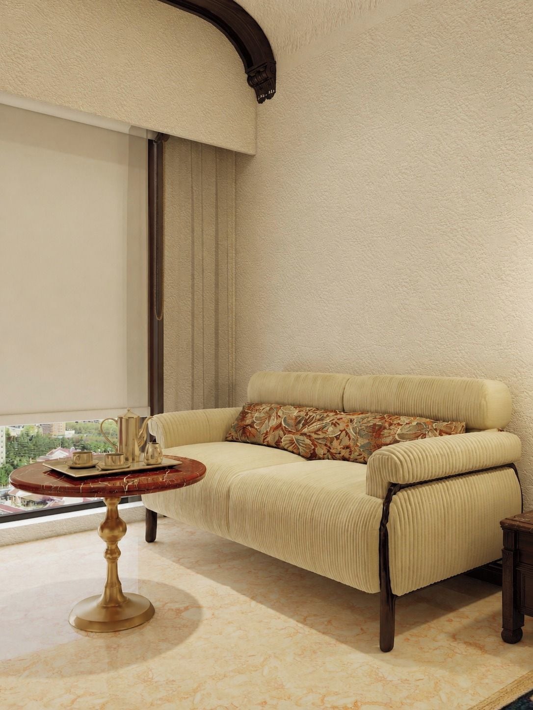 A room with a sofa, a round table with a tray, and a view through a window.