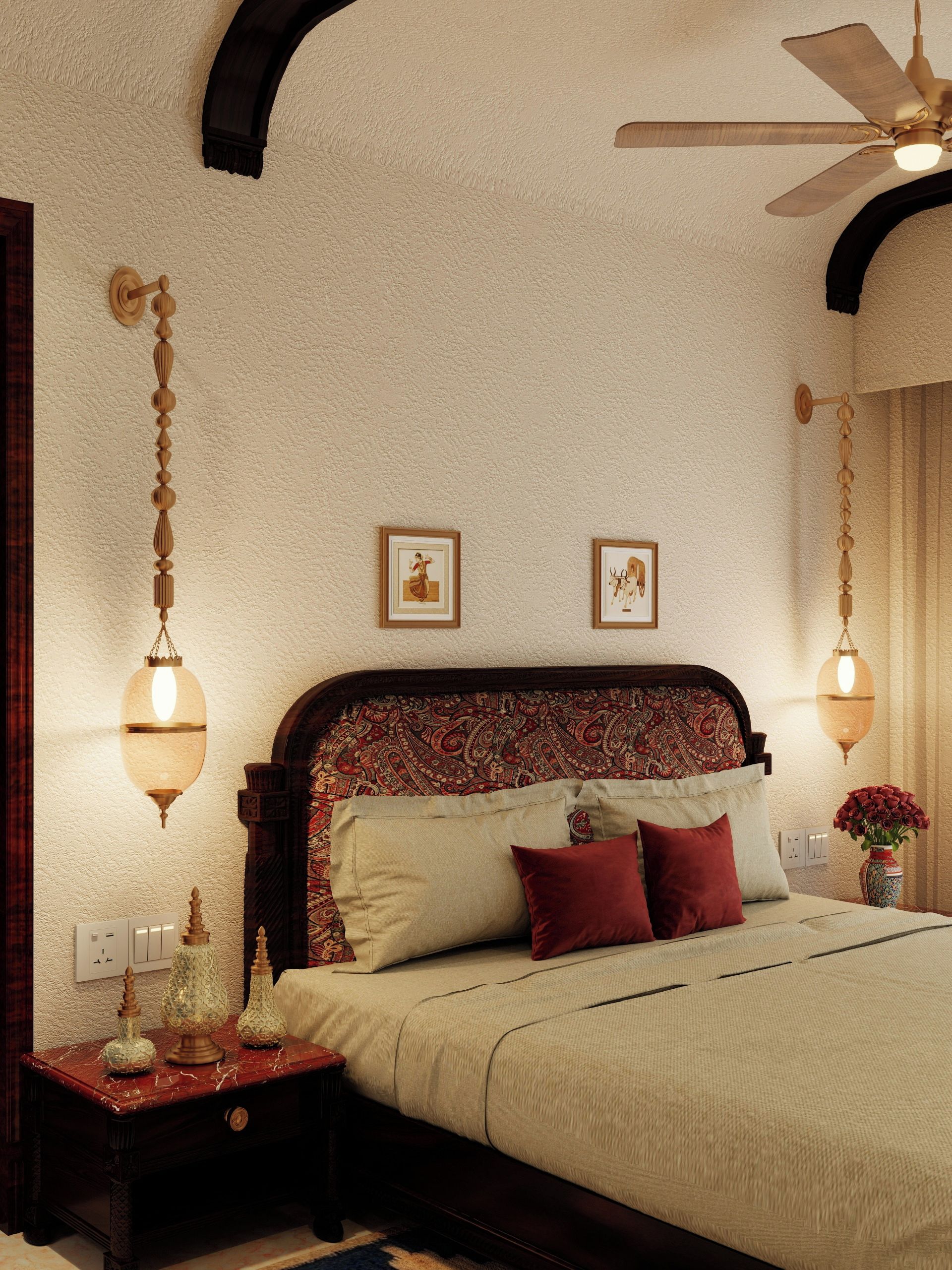 A bedroom with a bed, nightstands, a ceiling fan, wall-mounted lights, and framed pictures.