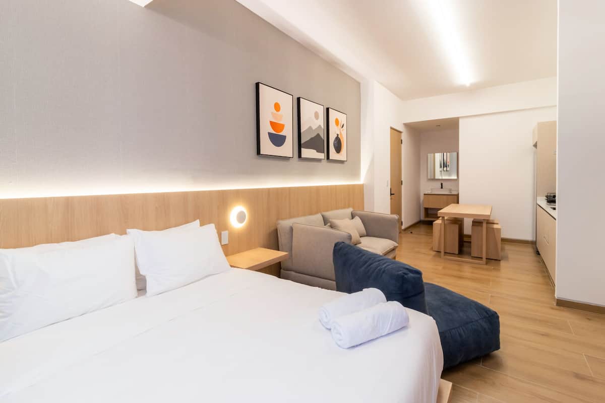 Superior Studio, City View | Premium bedding, in-room safe, desk, laptop workspace