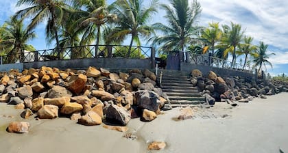 Peaceful 4-bedroom beach house with AC and private pool