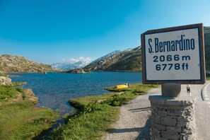 A sign indicating the elevation of S. Bernardino at 2066 meters or 6778 feet. - Residenza Larix 205 Modern Alpine Stay in San Bernardino | Ski, Hiking & Nature, San Bernardino, Switzerland (San Bernardino)