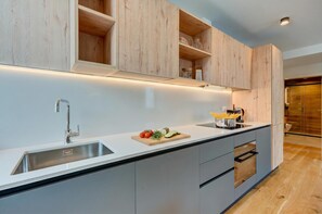 Private kitchen - Residenza Larix 103 Modern Alpine Stay In San Bernardino | Ski, Hiking & Nature, San Bernardino, Switzerland (San Bernardino)