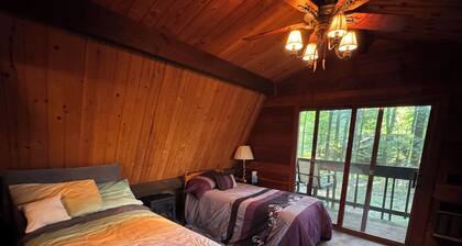 Relax in Nature in a gorgeous cozy cabin space that sleeps up to 8 people.