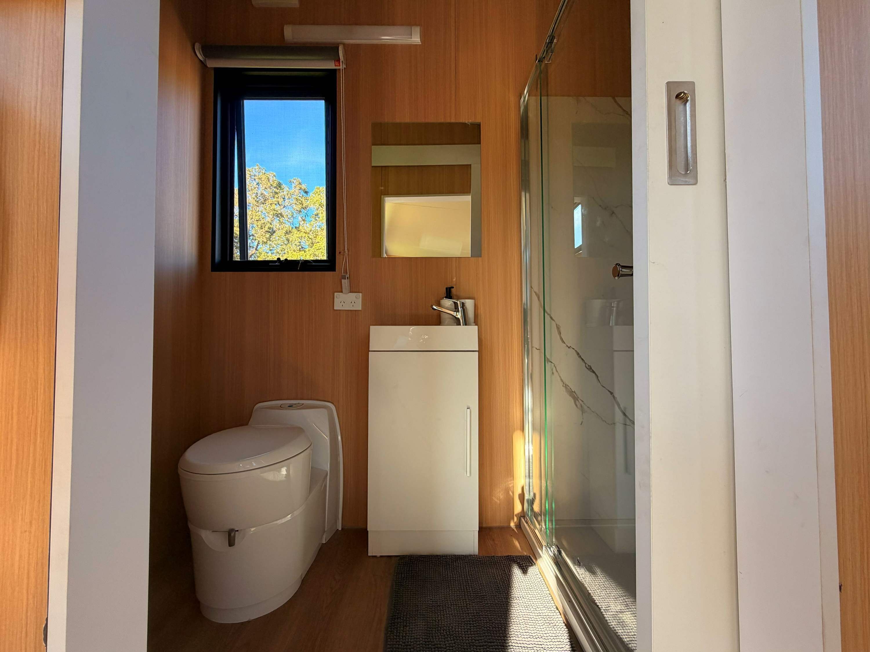 Shower, hair dryer, towels, shampoo