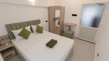 A hotel room with a bed, a nightstand, a wardrobe, a mirror, and a door.