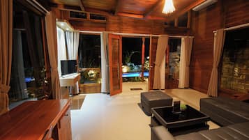 Deluxe Villa, 1 King Bed, Private Bathroom | Living area | 42-cm Smart TV with digital channels