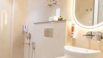 Shower, free toiletries, towels, soap
