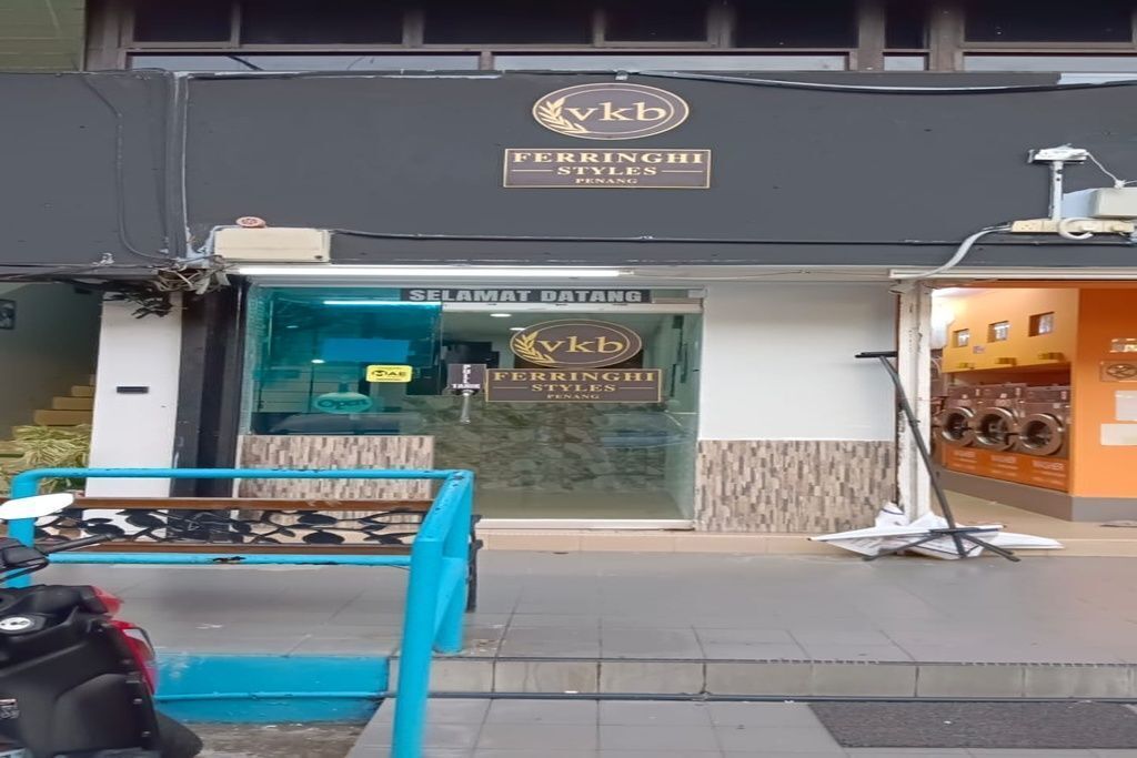A storefront with a sign reading 'FERRINGHI STYLES PENANG' and a visible entrance.