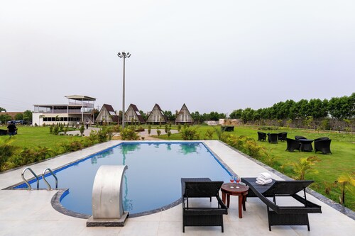 Alaya Stays Malik Farms Wooden Cottages