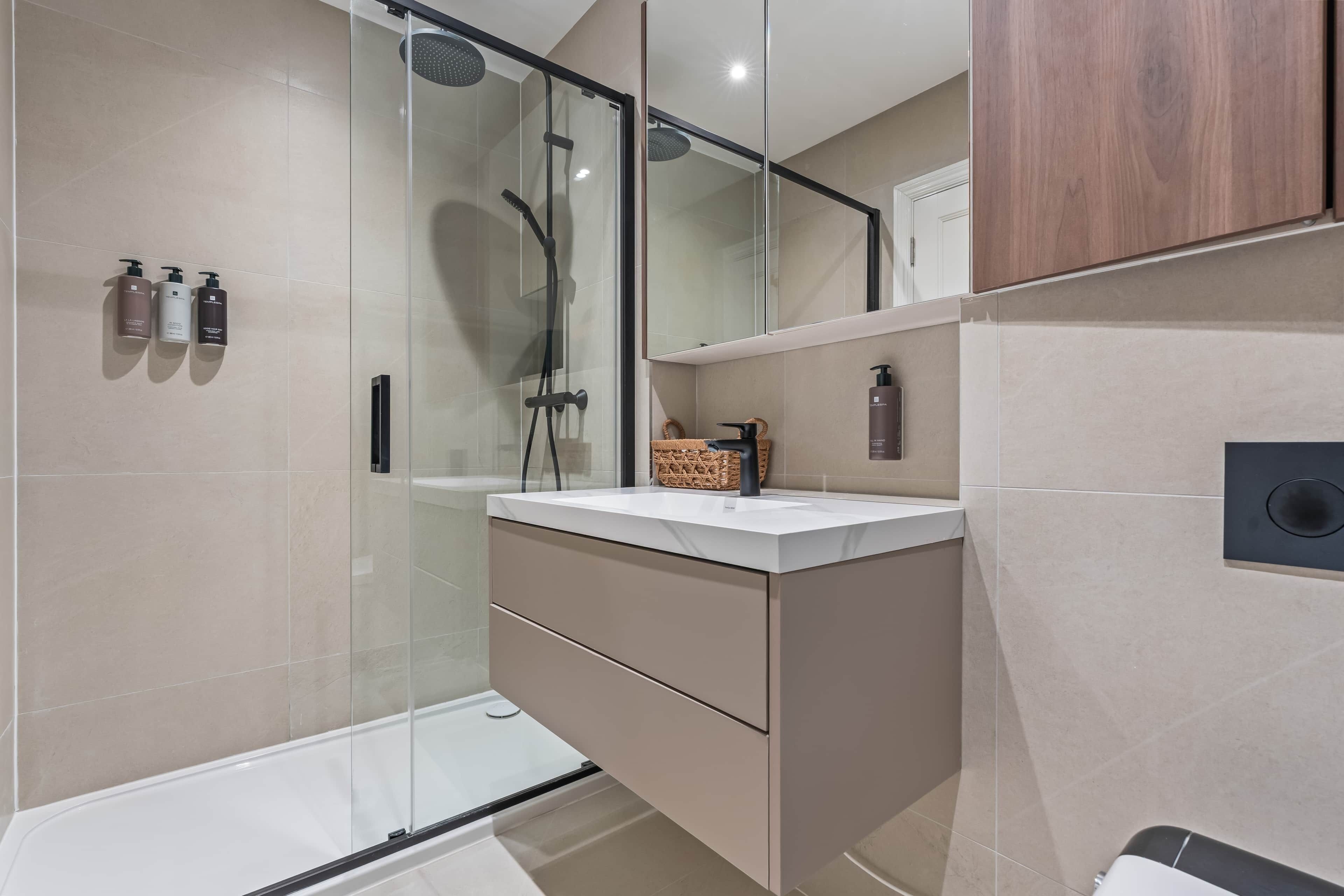 Shower, eco-friendly toiletries, hair dryer, towels