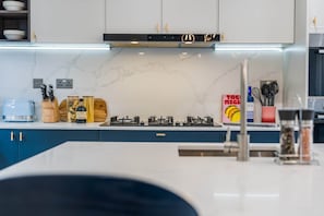 Fridge, stovetop, electric kettle, eco-friendly cleaning products