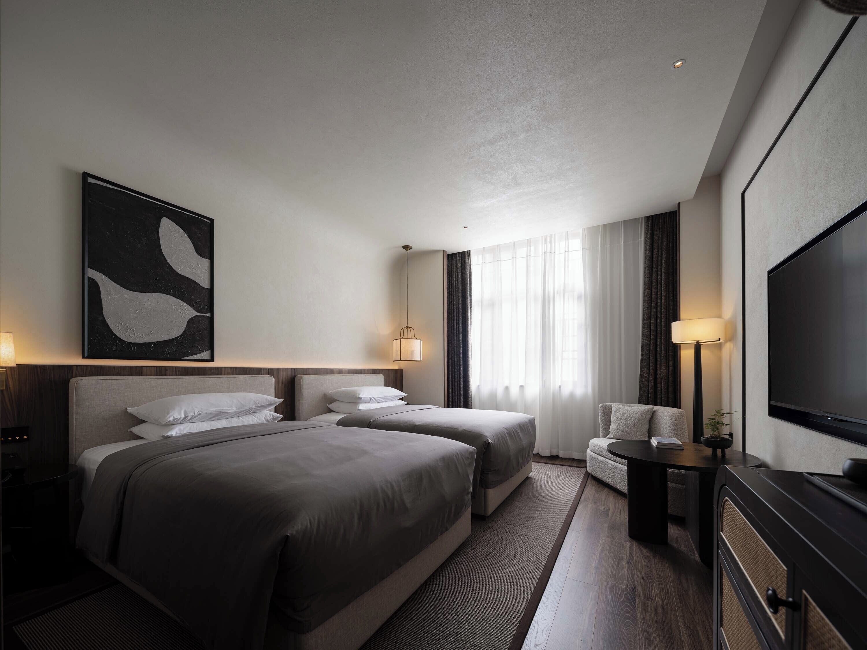 Quarto duplo standard | Frigobar, cortinas blackout, quartos à prova de som, Wi-Fi de cortesia