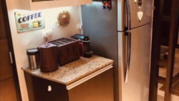Family Condo | Private kitchen | Full-size fridge, stovetop, cookware/dishes/utensils