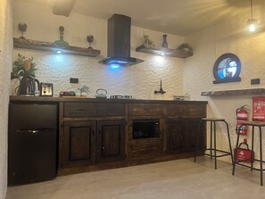 Fridge, microwave, toaster, cookware/dishes/utensils