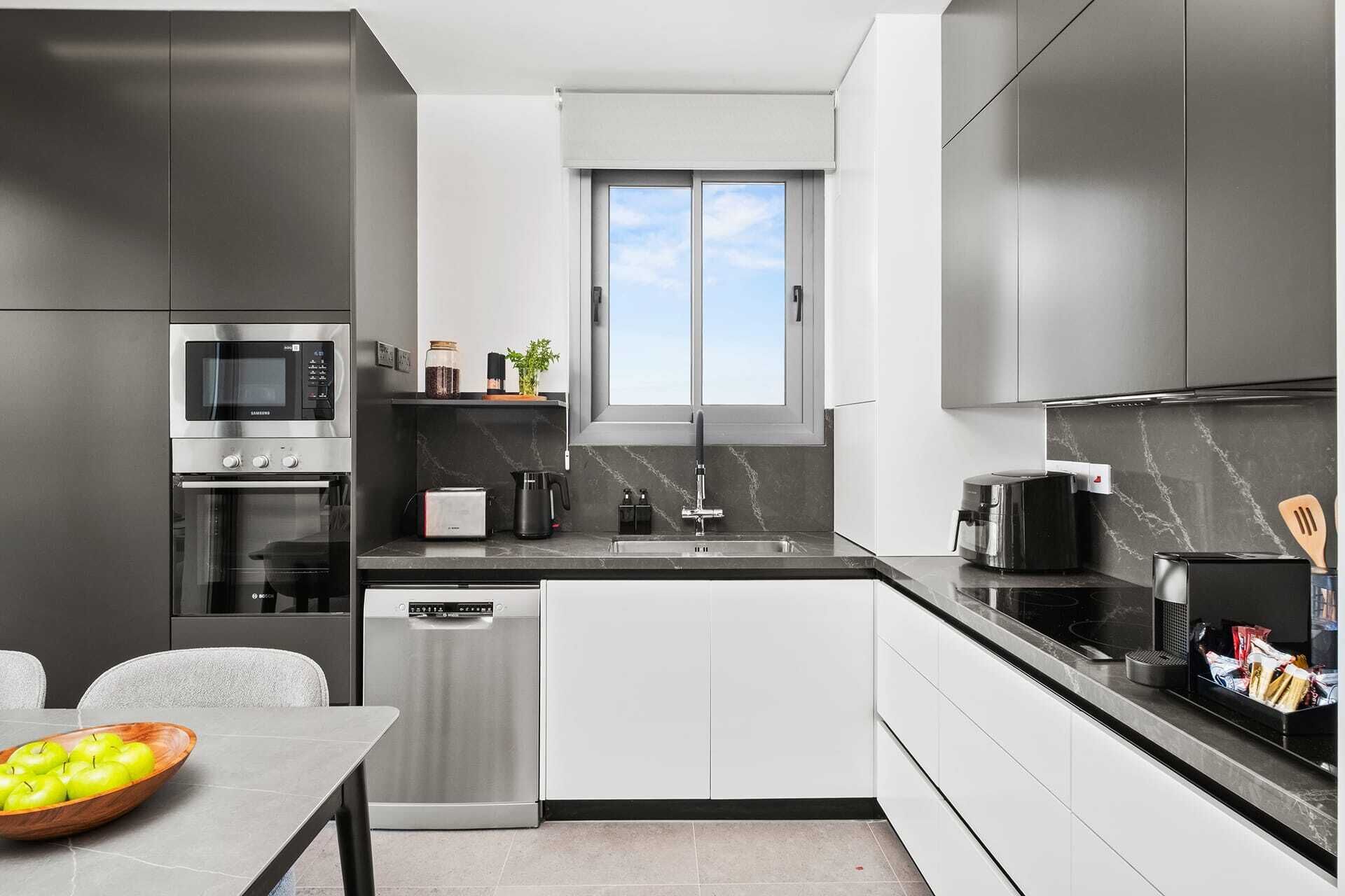 Coffee/tea maker, fridge, microwave, oven