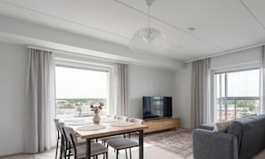 Comfort Apartment, 2 Bedrooms, City View | Living area | 55-inch Smart TV with cable channels