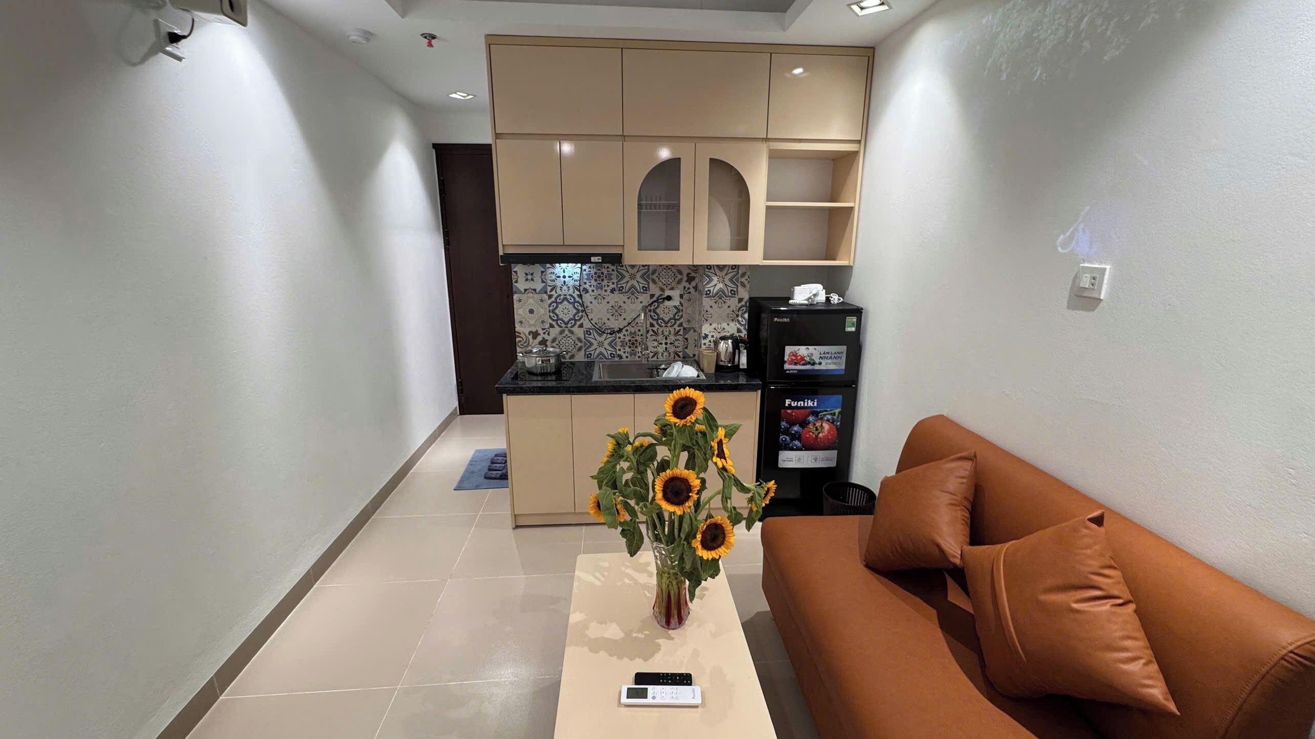 Quarto standard, vista para a cidade | Área de estar