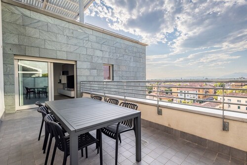 An elegant 198-square-meter apartment, perfect for six guests, located on the sixth floor of a modern building with an elevator (NOT accessible to people with disabilities).The property is situated in Treviglio, a town known for its lively historic cente