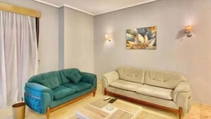 Smart TV - Chic 2BR Apartment with Private Garden | Prime Location by AUC (Cairo Governorate)