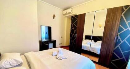 Chic 2BR Apartment with Private Garden | Prime Location by AUC