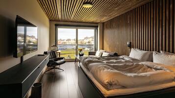 Superior Double Room, Sea View | Desk, laptop workspace, blackout curtains, iron/ironing board