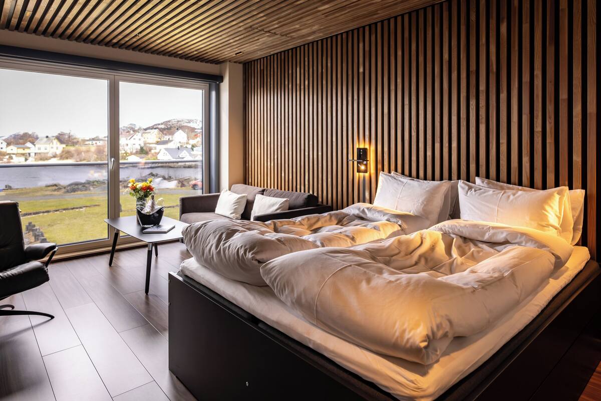 Superior Double Room, Sea View | Desk, laptop workspace, blackout drapes, iron/ironing board