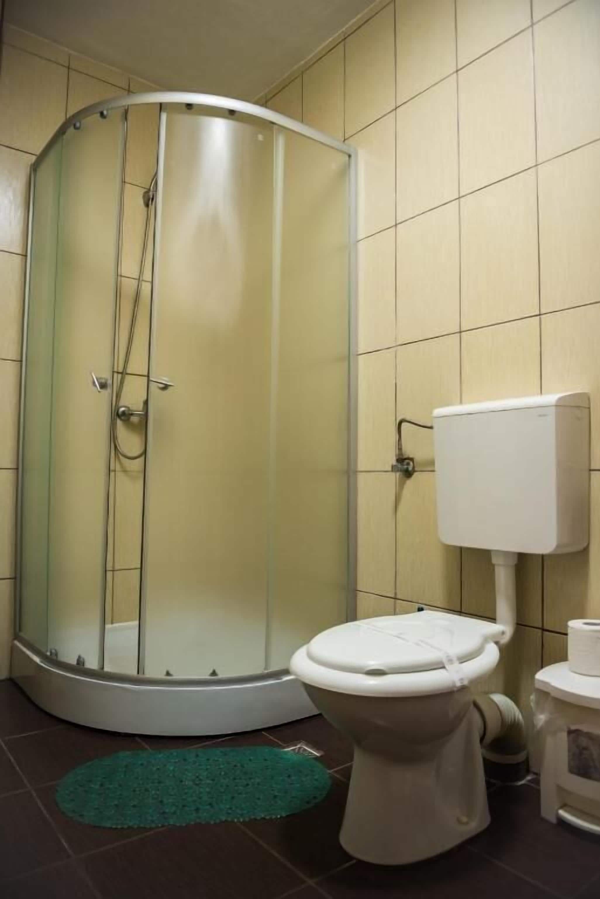 Double Room, Balcony, City View | Bathroom | Shower, free toiletries, hair dryer, towels