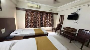 Habitación familiar | Sábanas de algodón egipcio y ropa de cama de alta calidad