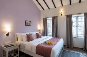 Habitación Deluxe | Sábanas de algodón egipcio, ropa de cama de alta calidad, caja fuerte