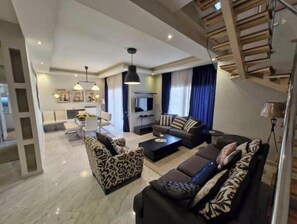 Living area - Modern 3BR Apartment in The Village Compound | Near AUC | WiFi & Terrace (Cairo Governorate)
