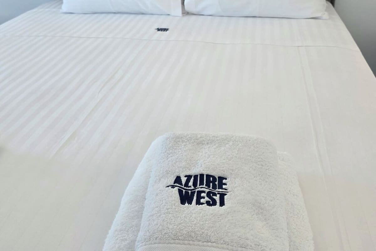 In-room safe, laptop workspace, blackout drapes, soundproofing