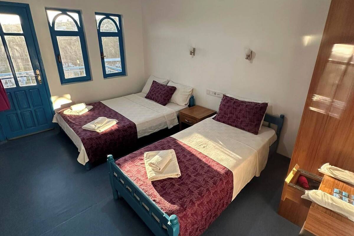 Classic Triple Room, Balcony | Free WiFi