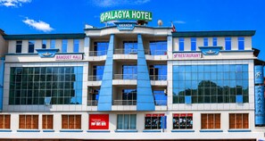 A hotel with a prominent sign, a banquet hall, and a restaurant. - Palagya Hotel (Kathmandu)
