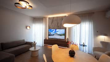 Apartment, 2 Bedrooms | Living area | 65-inch Smart TV with cable channels, Netflix, streaming services
